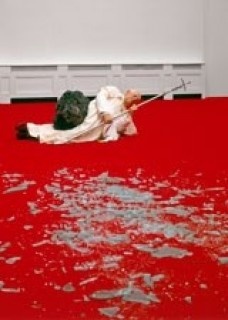 Maurizio Cattelan. La Nona Ora, 1999. Polyester resin, wax, pigment, human hair, fabric, clothing, accessories, stone, glass, and carpet, dimensions variable. Courtesy of the artist. © Maurizio Cattelan. Photo: Attilio Maranzano<br />Photo: Attilio Maranzano 