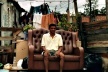 Homem na poltrona<br />Foto Iatã Canabrava  [Exposição Uma outra cidade]