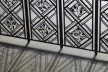 Detail of wrought iron fence that separates the main floor of the hall of honor<br />Foto Georges de Kinder  [Ma² - Metzger and Partners Architecture]