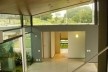 Vista a partir do estúdio - O pavilhão abriga os ambientes de convivência, com exceção do volume da sala de TV que faz um contraponto a esta leveza<br />Imagem dos autores do projeto 