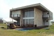 Casa no Xangri-lá, Condomínio Ventura Club. Pro A Profissionais de Arquitetura Ltda, 2011. Xangri-lá RS Brasil<br />Foto ProA 