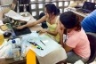 Oficina de Modelos, 12 de fevereiro, tarde, alunas desenvolvem no CAD a geometria das estruturas das lajes<br />Foto Abilio Guerra 