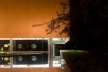 FHE – Fundação Habitacional do Exército, vista noturna, fachada sul com brises verticais e empena leste em concreto e brises. Escritório MGS – Macedo, Gomes & Sobreira<br />Foto Joana França 