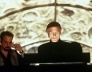 Ed Harris como Christof no filme Show de Truman, de Peter Weir