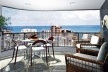 Figura 06 – Vista para o mar e o verde do manguezal. Representação da varanda do Edifício Alameda dos Pinheiros, Boa Viagem, veiculada em jornais dominicais [Moura Dubeux Engenharia, 2004]