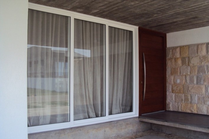 Casa no Xangri-lá, Condomínio Ventura Club. Pro A Profissionais de Arquitetura Ltda, 2011. Xangri-lá RS Brasil<br />Foto ProA 