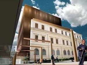 Vista do cubo em aço cortén e da passarela sinalizadora de fluxos<br />Imagem dos autores do projeto 