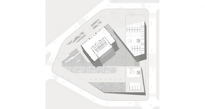 Planta na cota mais elevada do terreno: eixo de entrada por sobre o volume dos estudios; departamentos e café