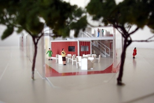 Figura 7 – Entrada com o café em primeiro plano e mezanino ao fundo