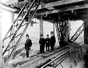 Quadro do Musée Grévin, que mostrava figuras de cera em meio a uma ainda inacabada Torre Eiffel