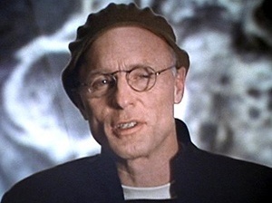 Ed Harris como Christof no filme Show de Truman, de Peter Weir